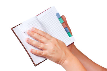 Open notebook for notes in the hands の写真素材