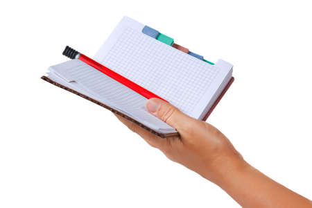 Open notebook for notes in the handの写真素材