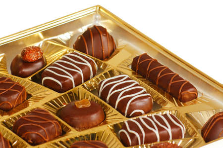 Sweets from a black and white chocolate in a boxの写真素材