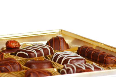 Sweets from a black and white chocolate in a boxの写真素材