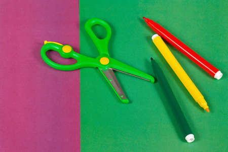 Colored paper, markers and scissors for childrenの写真素材