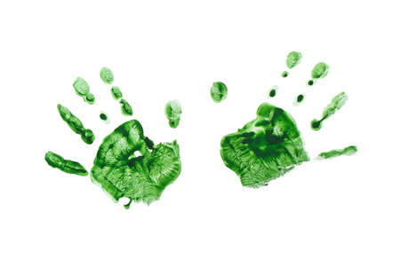 Green prints of children s hands isolated on a white backgroundの写真素材