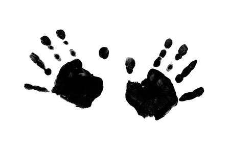 Black prints of children s hands isolated on a white backgroundの写真素材
