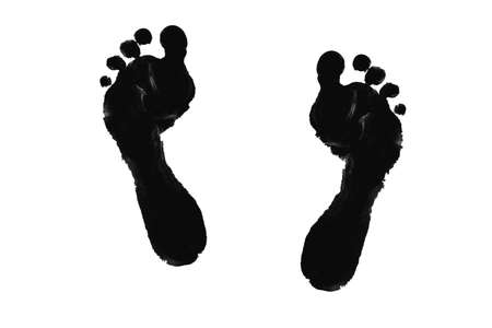 Black prints of children s feet isolated on a white backgroundの写真素材