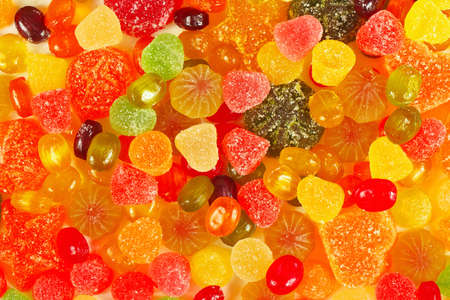 Background of colorful candies and jelly close upの写真素材