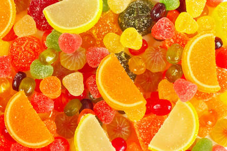 Background of colorful fruity sweets and jelly close up