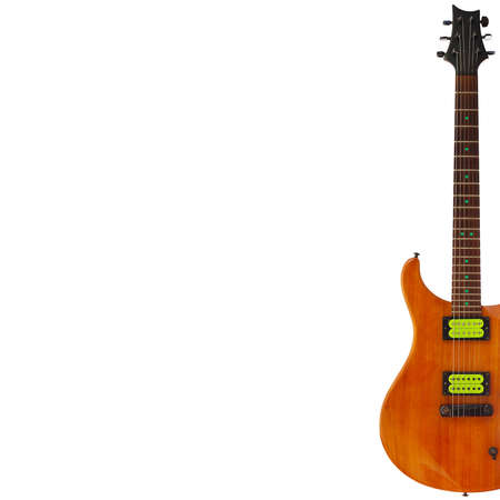 Mahogany electric guitar on the right side of the white background, with plenty of copy space.の写真素材