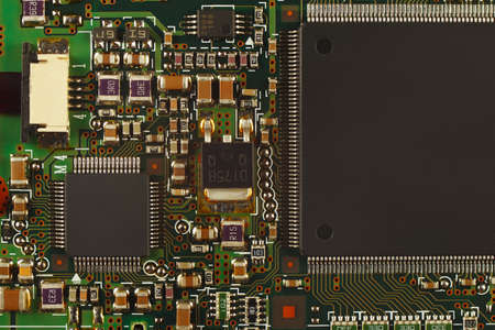 Microelectronic circuit board from a modern device close up.