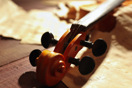 Vintage violin and rare sheet music close upの写真素材