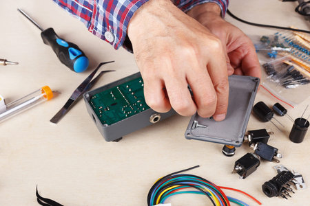 Repair of electrical components at the service workplace.