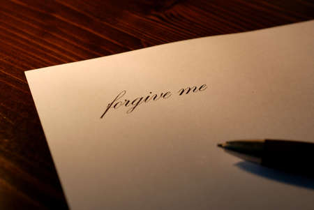 to write apologies, letter apologizing, forgive meの写真素材