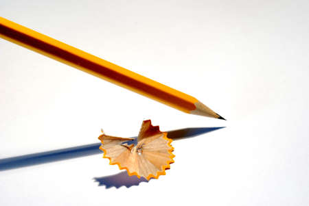 the yellow pencil on white background, the leaf of paperの写真素材