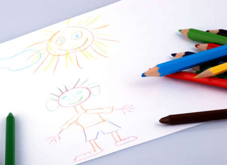 children's drawings and colourful crayonsの写真素材