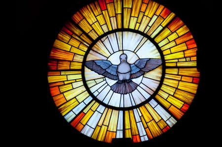 Stained glass picture of Outpouring of the Holy Spirit - photo taken in a church の写真素材