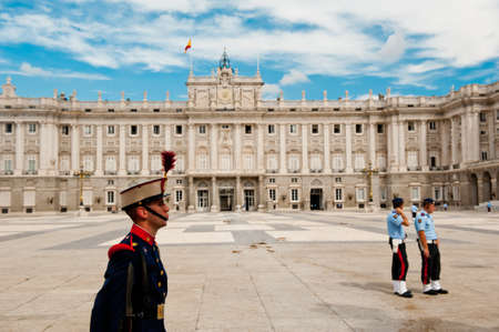 Madrid, Spain â October 2, 2013  Guard guard standing at attention in front of main gate of Royal Palace of Madridのeditorial素材