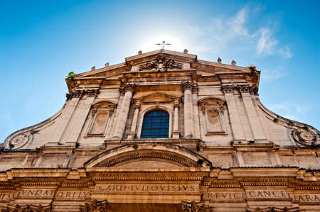 Cross over facade of the basilica in Romeの写真素材