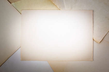 blank yellowed paper sheet at pile off paper sheetsの写真素材