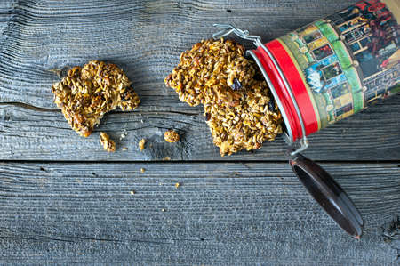 cereal cake and container at wooden dark backgroundの写真素材