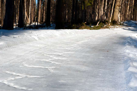 car chains marks at snowの写真素材