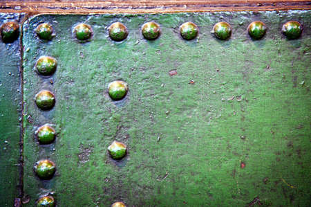 grained abstract industrial metal plates with rivets