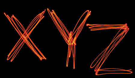 isolated uppercase letter x, y and z made of red laser beamの写真素材