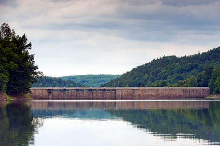 dam of the hydroelectric power plant at bystrzyckie lake near zagorze slaskieの写真素材