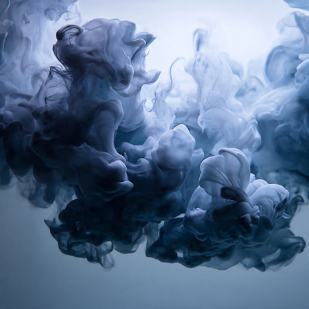 Blue ink in water. Abstract background for design. Toned.の素材