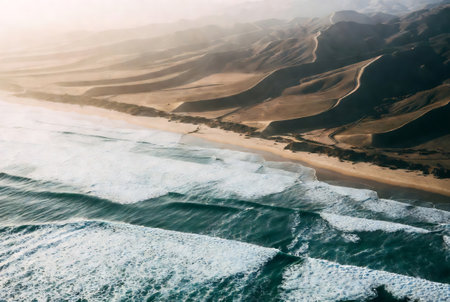 Aerial view of the sand dunes at sunset in Paracas National Reserve, Peruの素材