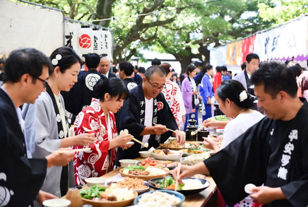 Unidentified people enjoy eating Japanese food during KOBE Festival in Kyoto, Japanの素材