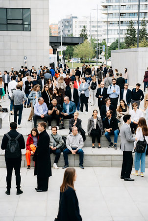 People gather outside Gucci fashion show building for Milan Women's Fashion Week in Milan.の素材
