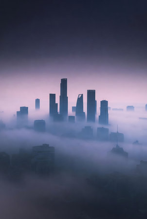 Aerial view of a foggy city with skyscrapers.の素材