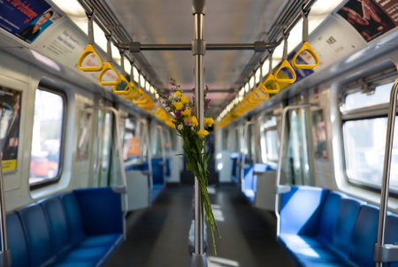 Interior of a train with a bouquet of flowers in the foregroundの素材