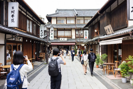 Tourists visit Higashiyama old town in Kyoto, Japan.の素材