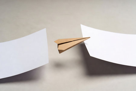 Paper plane flying on a white background. Business concept. Copy space.の素材