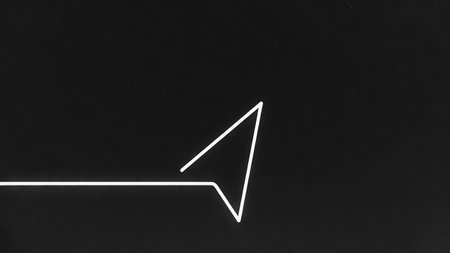 White neon arrow on a black background. The concept of creativity.の素材