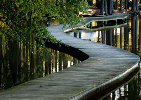 bridge over still waterの写真素材