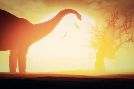 Dinosaurs in a Prehistoric Sunset Sunrise with Dried Trees in an Endless Desert 3D artworkの写真素材