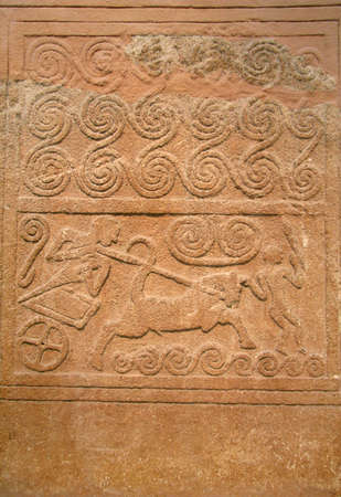 Ancient stone carving - excellent backgroundの写真素材