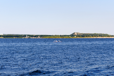 kayak floating on the volga riverの写真素材