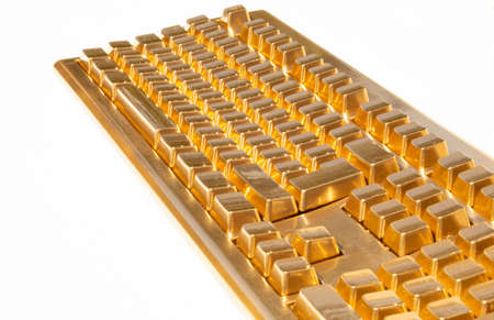 Golden keyboard on a sunny day.の写真素材