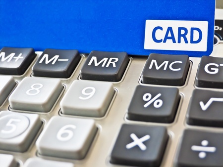 Close-up credit card and check on the calculator.の写真素材