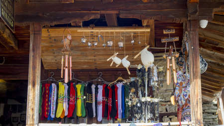 Zheravna/Bulgaria - March 3, 2020: Historic wooden house from the 19th century selling colorful...