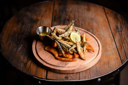 Deep fried fish and crispy potatoesの写真素材