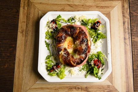 Roasted bagel stuffed with bacon and cheeseの写真素材