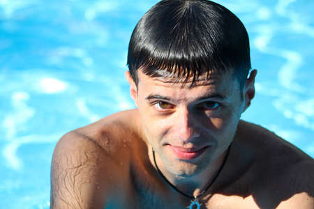 man look in blue water