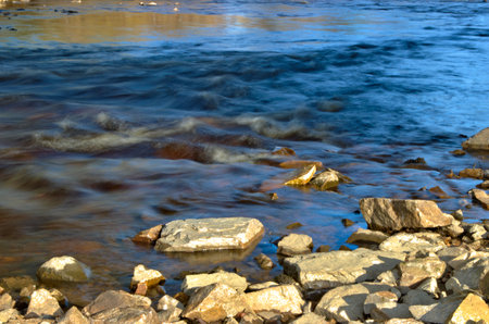 River runs their waters to its place on earth springの写真素材
