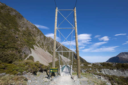 Suspension bridge on Hooker Valley track in Mt Cook National Park, New Zealandの写真素材