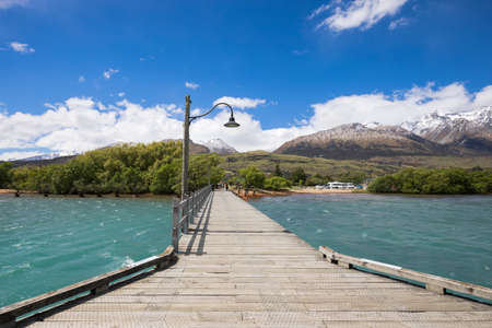 Wooden jetty on Lake Wakatipu, Glenorchy, New Zealandの写真素材