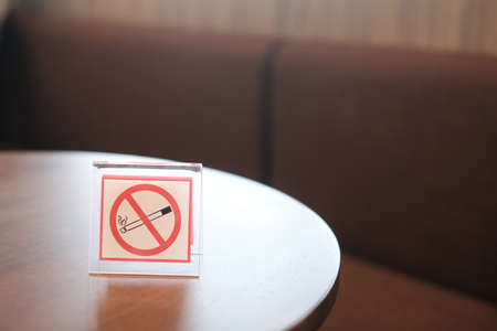 no smoking sign on table with copy space for design.の写真素材