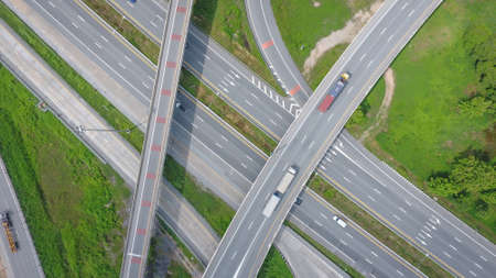 Aerial highway junction. Busy highway from aerial view, Road traffic in city at thailand.の写真素材